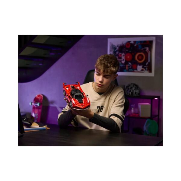 LEGO Technic model of a Ferrari FXX K, showcasing intricate details and a sleek design in vibrant red and black colors