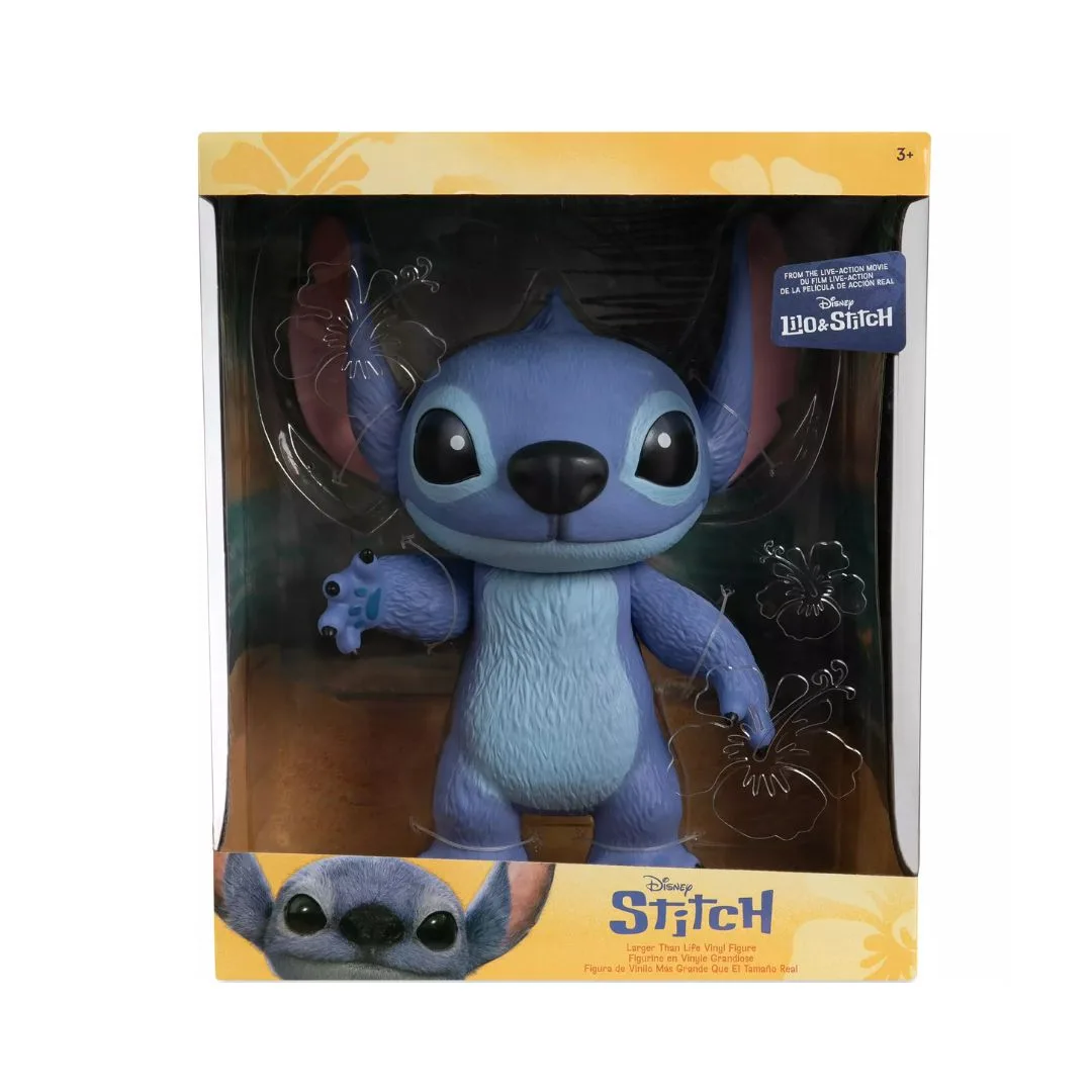 Large live-action figure of Disney's Stitch, showcasing his playful expression and vibrant blue color