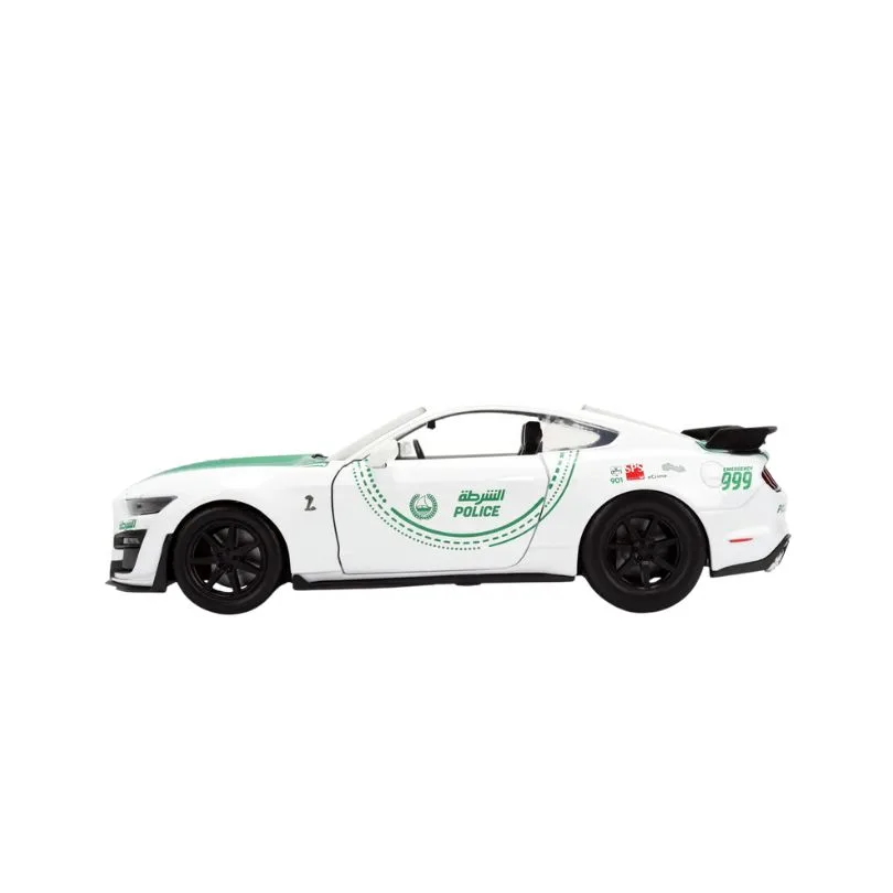 Model of a 2020 Ford Mustang in Dubai Police livery, scale 1:24, showcasing the vehicle's distinctive design and colors.