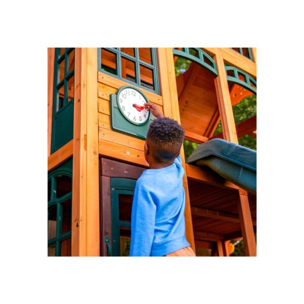 KidKraft Falcon Ridge Swing Set featuring swings, a slide, and climbing features in a backyard setting for children's play