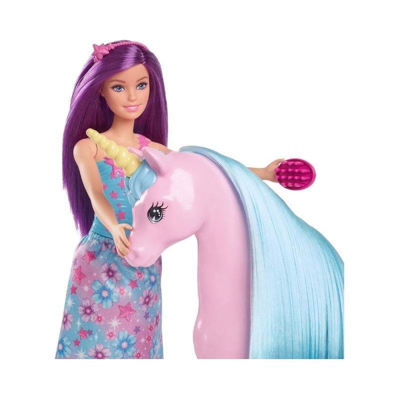 Barbie doll with a unicorn in a colorful fantasy playset, featuring accessories for imaginative play and storytelling
