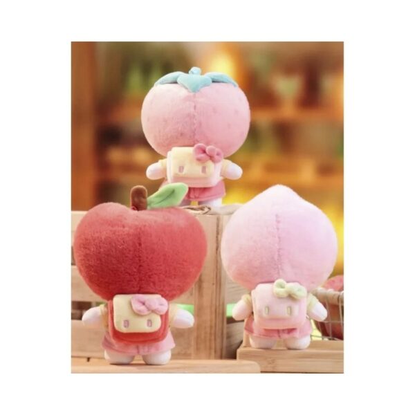 Plush pendant of Hello Kitty from the Fruity Paradise Series, displayed in a colorful blind box packaging