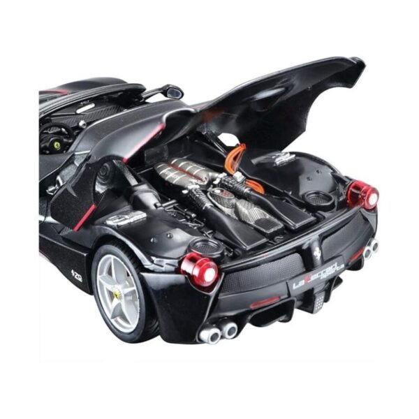 Die-cast model of a 1:24 scale Ferrari LaFerrari Aperta in red, showcasing its sleek design and detailed features