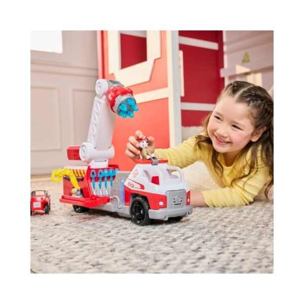 Deluxe Paw Patrol fire truck toy featuring bright colors and characters, designed for imaginative rescue play