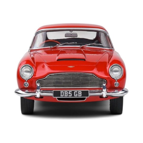 1:18 scale model of a red 1964 Aston Martin DB5, showcasing its classic design and detailed features
