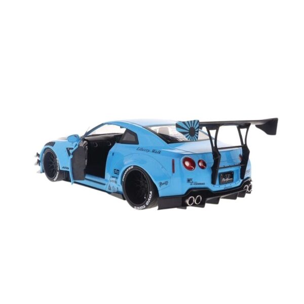 Baby blue diecast car displayed on a shelf, showcasing its detailed design and craftsmanship in an automotive collection