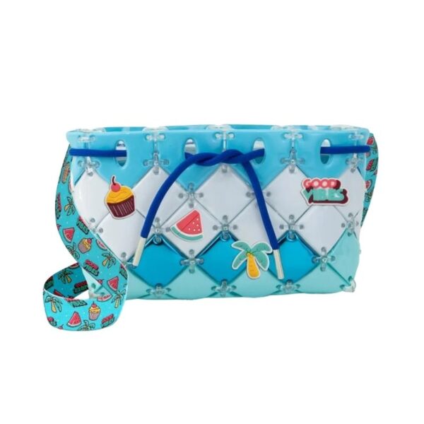 Medium blue Studio Bags displayed on a neutral background, showcasing their sleek design and functional features