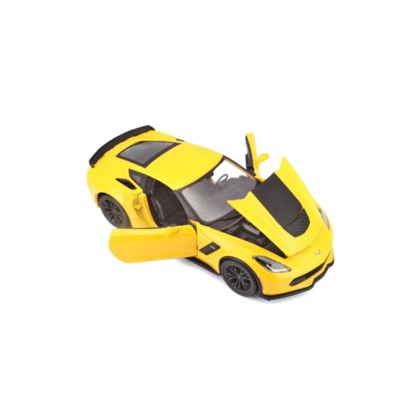 Die-cast model of a yellow 2015 Corvette Z06, scale 1:24, showcasing detailed design and sleek lines