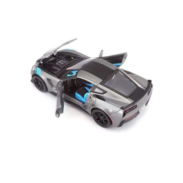 Die-cast model of a 2017 Corvette Grand Sport in 1:24 scale, showcasing its sleek design and vibrant color