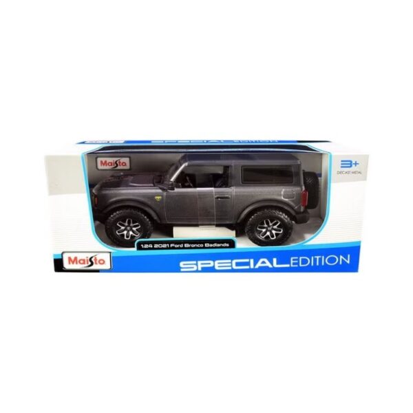 Diecast model of a 2021 Ford Bronco Badlands in gray, showcasing detailed design and realistic features