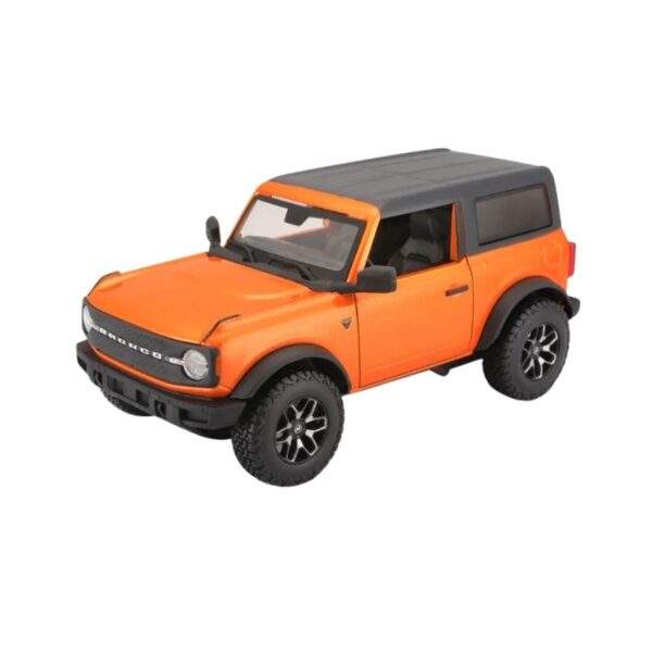 Diecast model of a 2021 Ford Bronco Badlands in orange, showcasing detailed features and realistic design