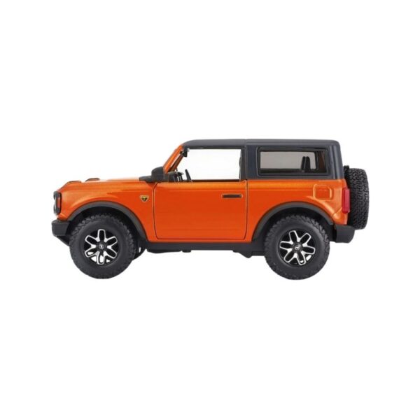 Diecast model of a 2021 Ford Bronco Badlands in orange, showcasing detailed features and realistic design