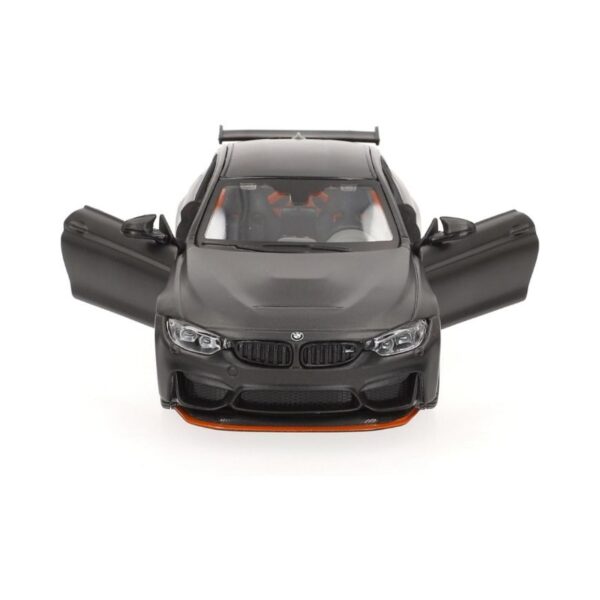 Die-cast model of a Maisto 1:24 BMW M4 GTS in orange, showcasing detailed design and realistic features.