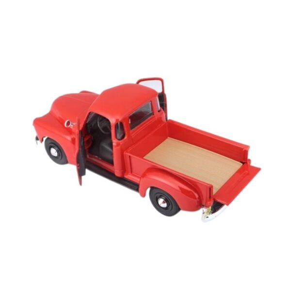 Maisto 1:25 scale model of a 1950 Chevrolet 3100 Pickup in classic blue color, showcasing detailed design and craftsmanship