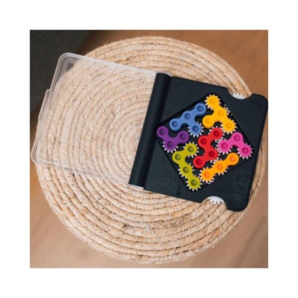 Colorful gears in various sizes interlock to form a brain teaser game designed to enhance problem-solving skills