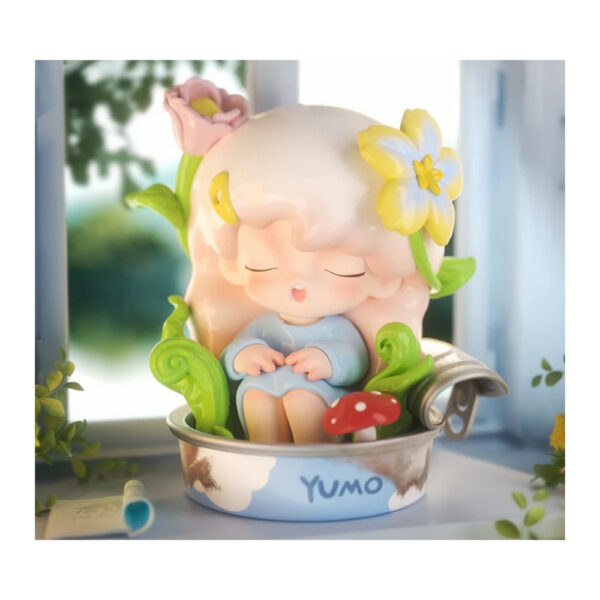 Jotoys Yumo Dreamcore Island Series Blind Box featuring colorful, whimsical characters in a decorative packaging