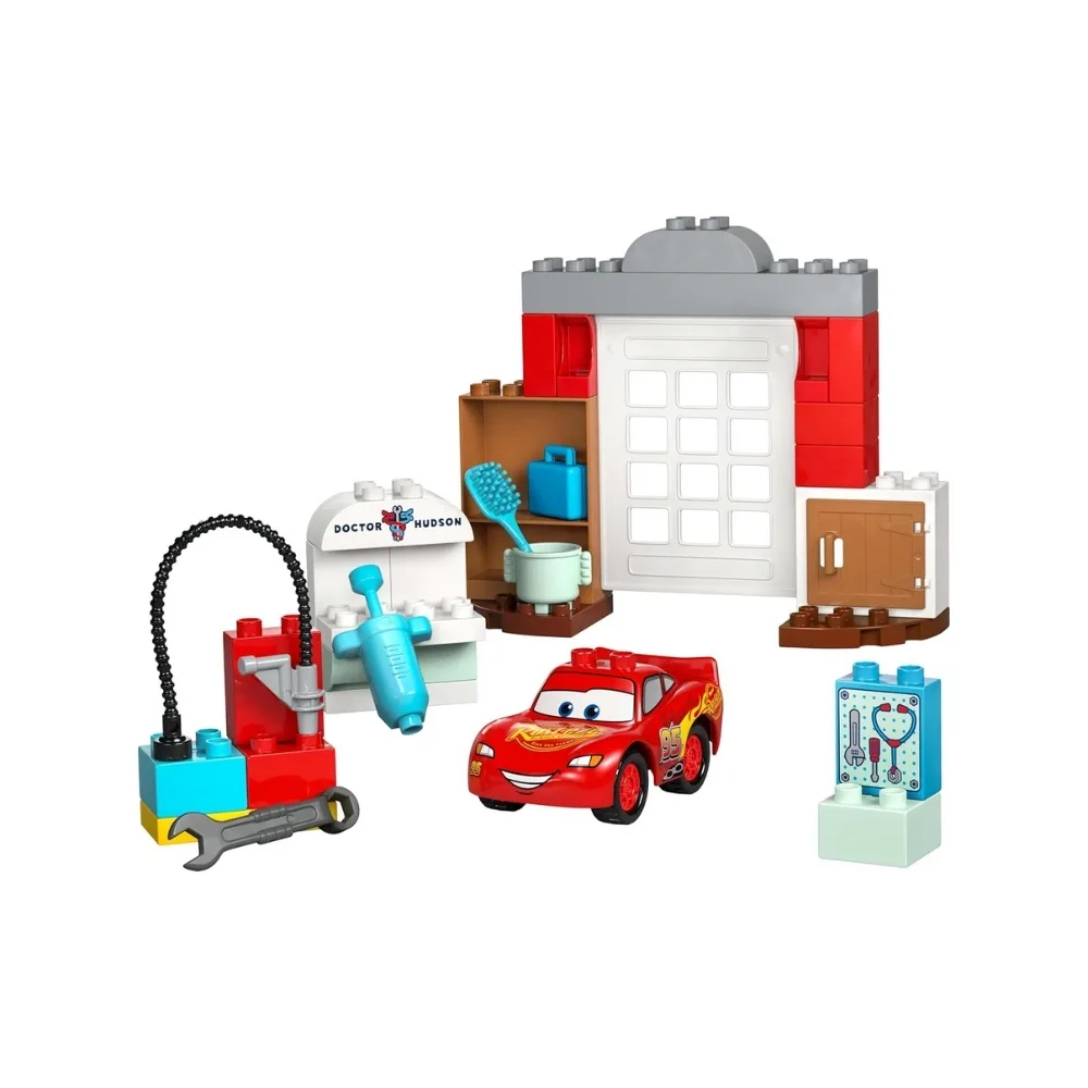 LEGO Duplo set featuring Disney and Pixar's McQueen visiting Doc, with colorful blocks and characters for imaginative play