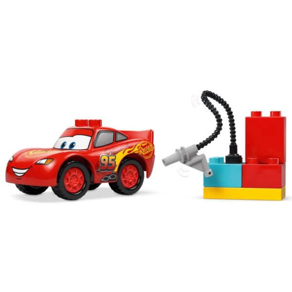 LEGO Duplo set featuring Disney and Pixar's McQueen visiting Doc, with colorful blocks and characters for imaginative play