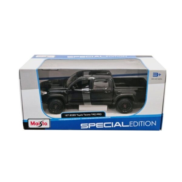 Maisto 1:27 scale model of a 2023 Toyota Tacoma TRD PRO in black, showcasing detailed design and features.