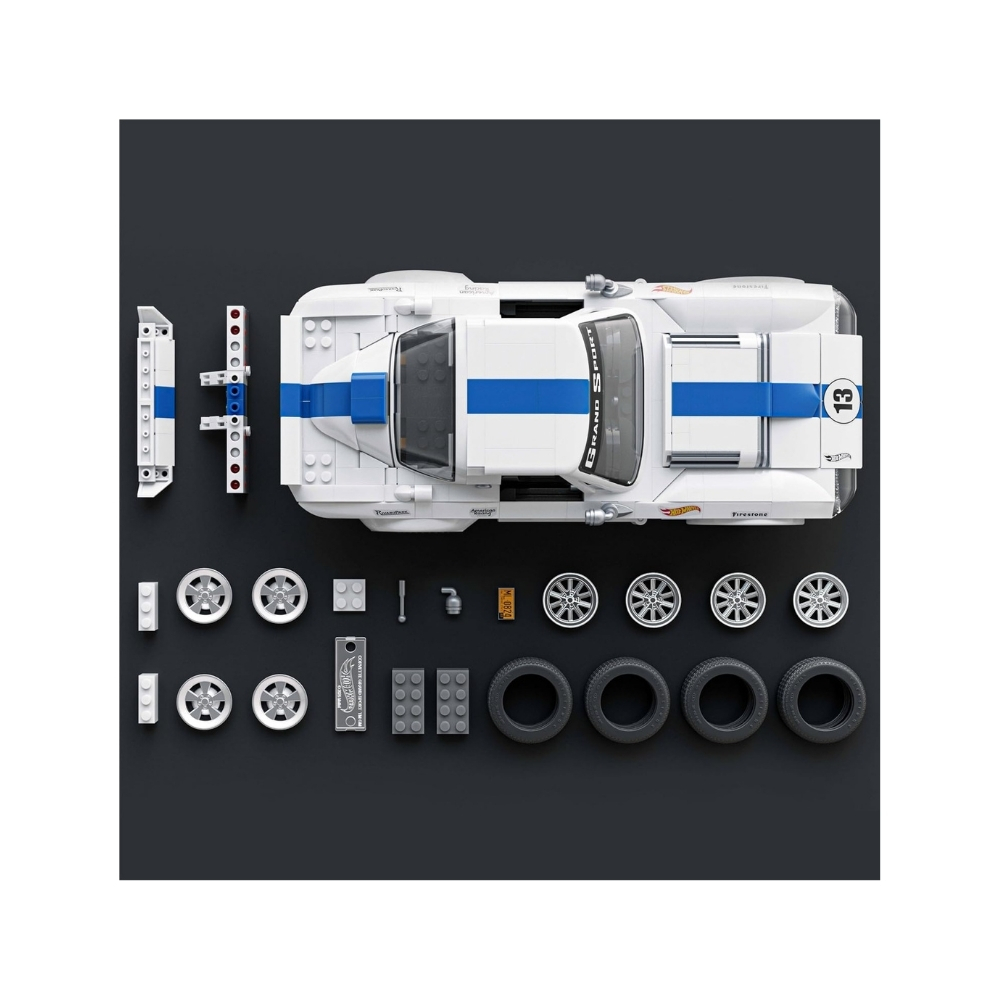 Mattel Brick Shop Hot Wheels Elite Corvette Grand Sport – JGR31-2 Hot Wheels Elite Corvette Grand Sport model from Mattel, showcasing a detailed die-cast design in vibrant colors