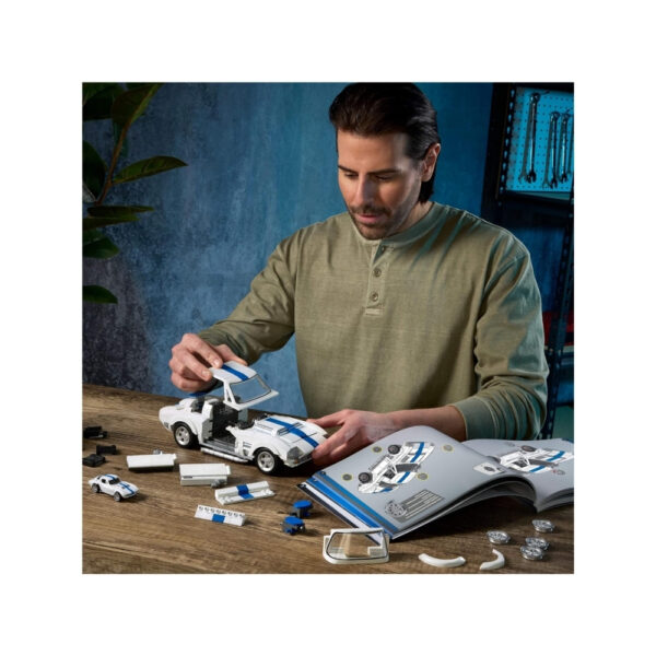 Hot Wheels Elite Corvette Grand Sport model from Mattel, showcasing a detailed die-cast design in vibrant colors