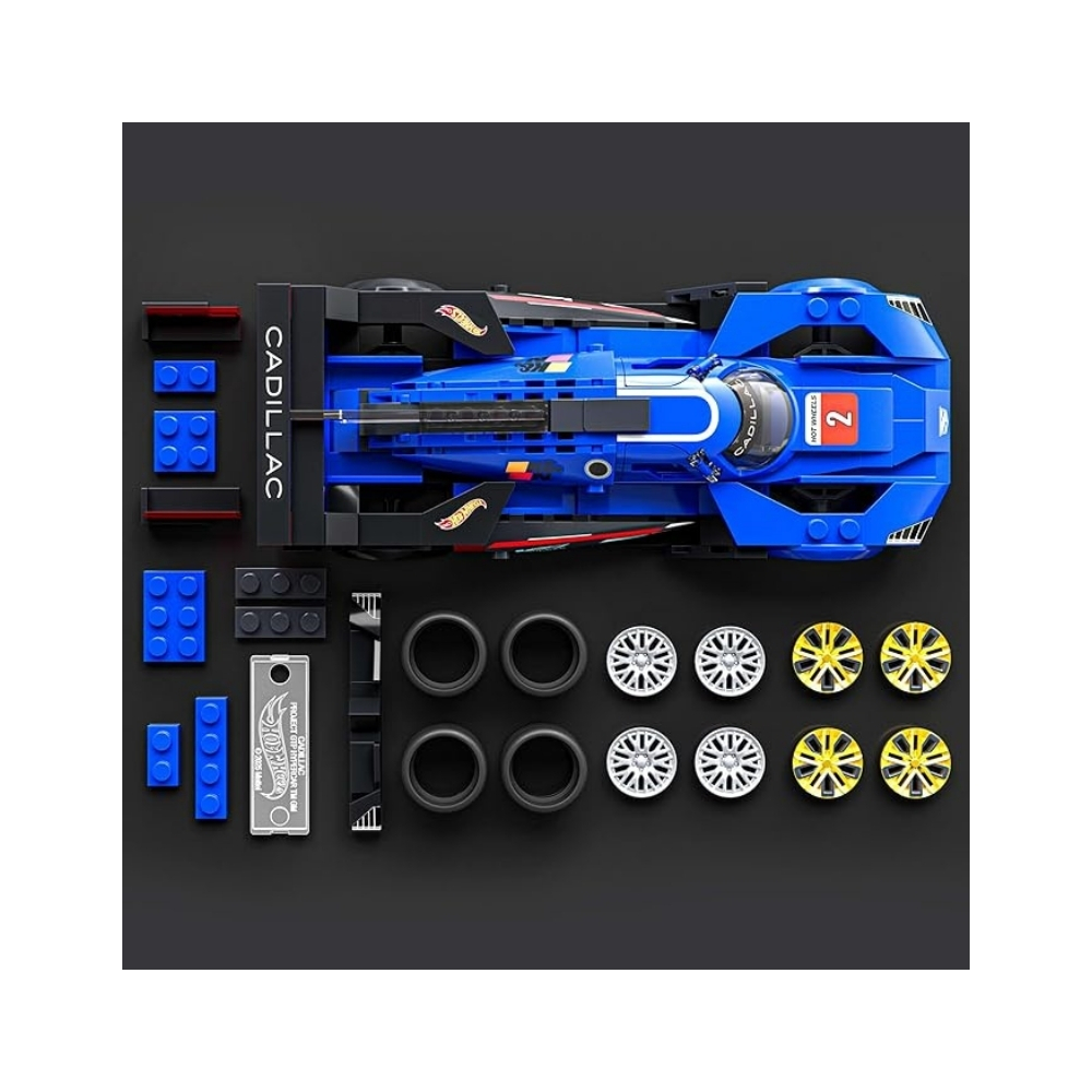 Mattel Brick Shop Hot Wheels Speed Cadillac – JFR89 -3 Hot Wheels Speed Cadillac toy car from Mattel, featuring vibrant colors and sleek design, displayed in a brick shop setting