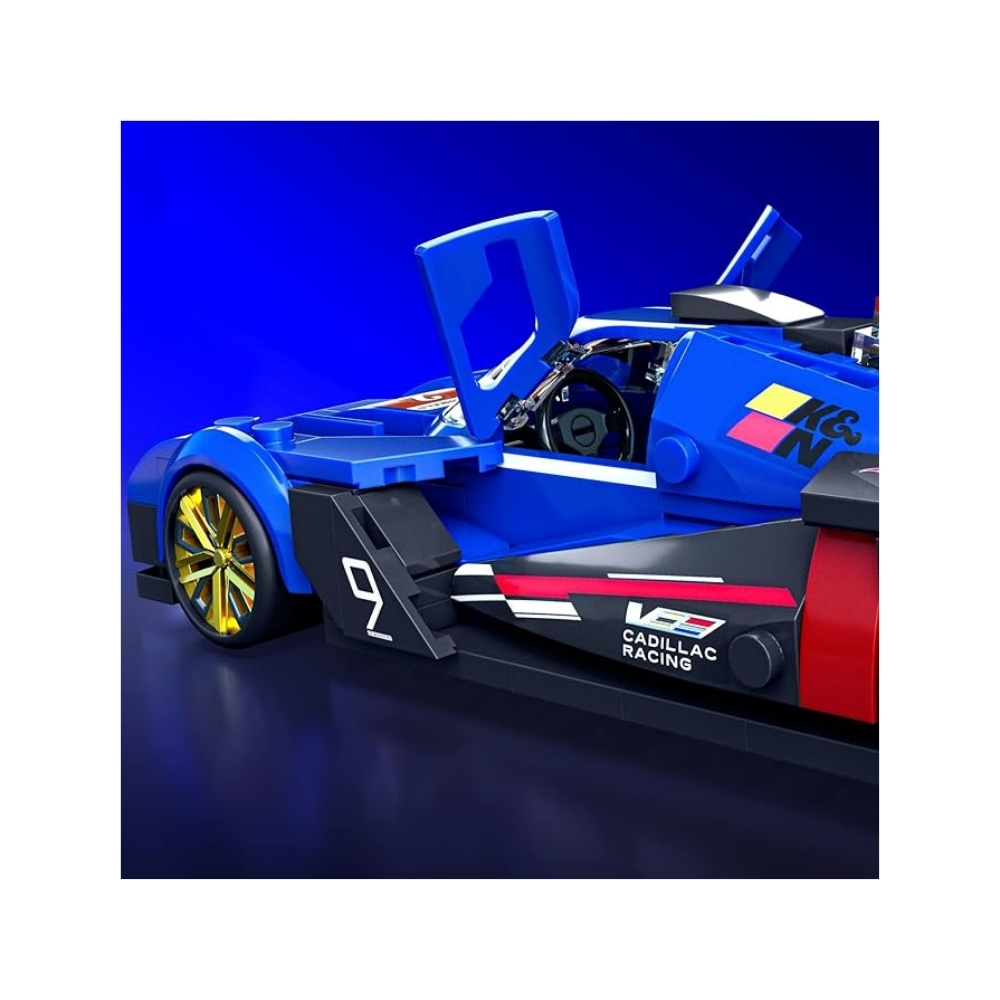 Mattel Brick Shop Hot Wheels Speed Cadillac – JFR89 -5 Hot Wheels Speed Cadillac toy car from Mattel, featuring vibrant colors and sleek design, displayed in a brick shop setting