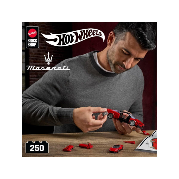 Hot Wheels Speed Maserati toy car from Mattel, featuring sleek design and vibrant colors, ideal for racing play