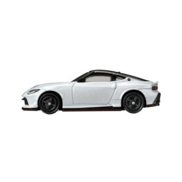 A detailed model of a Takara Tomy Tomica Fairlady Z Nismo sports car, showcasing its sleek design and vibrant colors