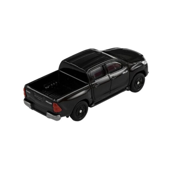 A Takara Tomy Tomica model of a Toyota Hilux, showcasing detailed design and vibrant colors in a toy format
