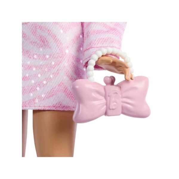 Barbie Deluxe Style Doll dressed in a denim outfit featuring a matching jacket and skirt