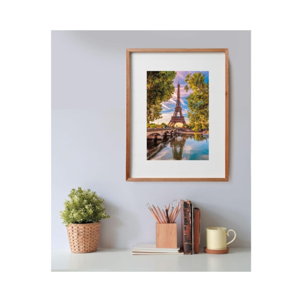 500-piece Clementoni puzzle featuring a scenic view along the Seine River, showcasing vibrant colors and charming architecture