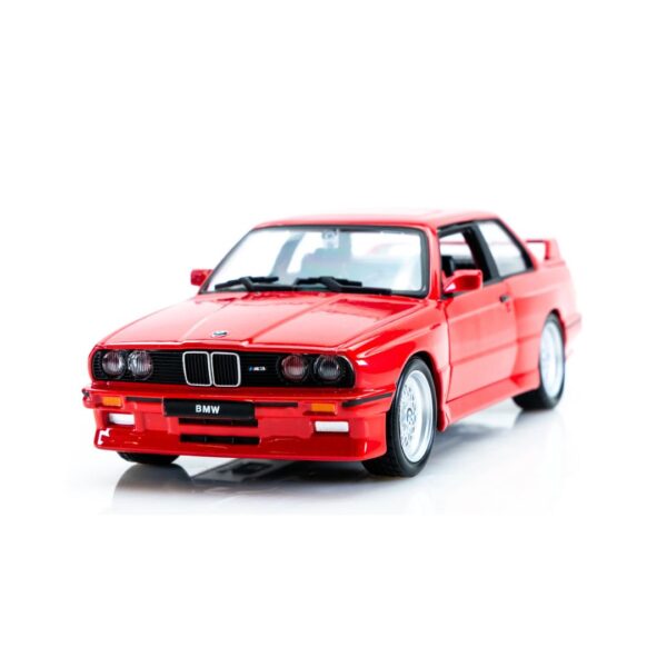 Red 1/24 scale diecast model of a 1988 BMW 3 Series M3 E30 by Bburago, showcasing detailed design and craftsmanship.
