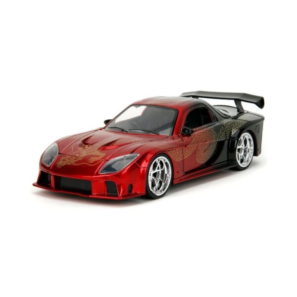 1:24 scale pink Mazda RX-7 Widebody from 1995, emphasizing its unique styling and eye-catching color.