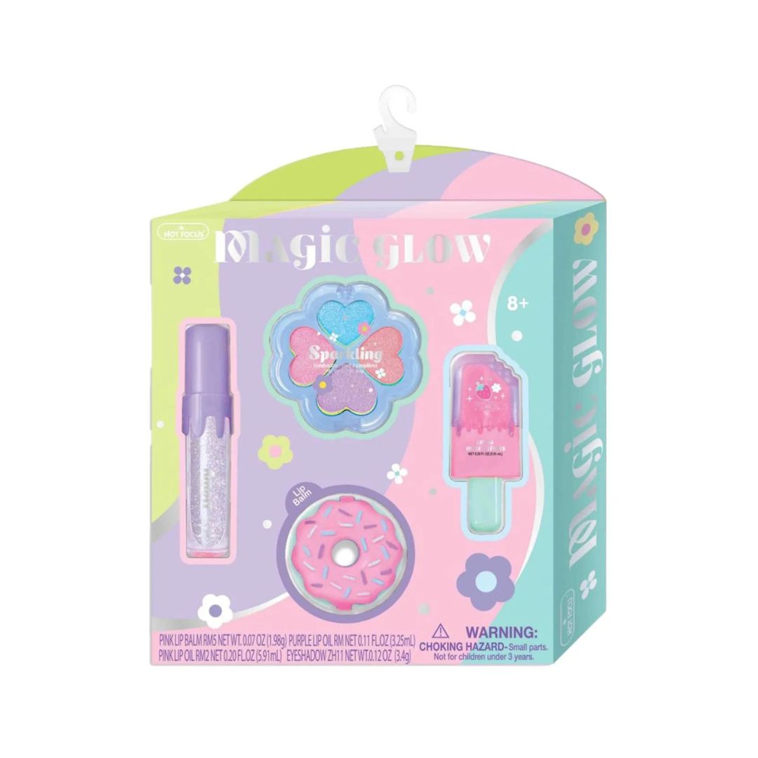 Hot Focus Magic Glow Beauty Set featuring vibrant makeup products for a radiant look, displayed in an elegant packaging.